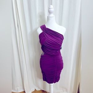 Purple polyester rich party/cocktail with silver decoration on the right side